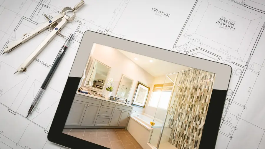 Remodeled primary bathroom with tiled shower by Skycrest Homes