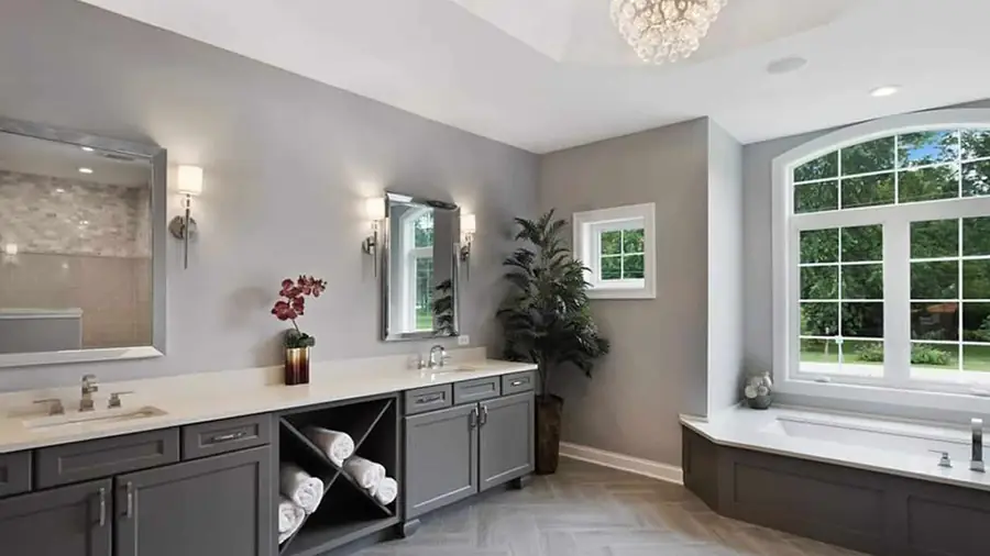 Remodeled bathroom with freestanding tub by Skycrest Homes