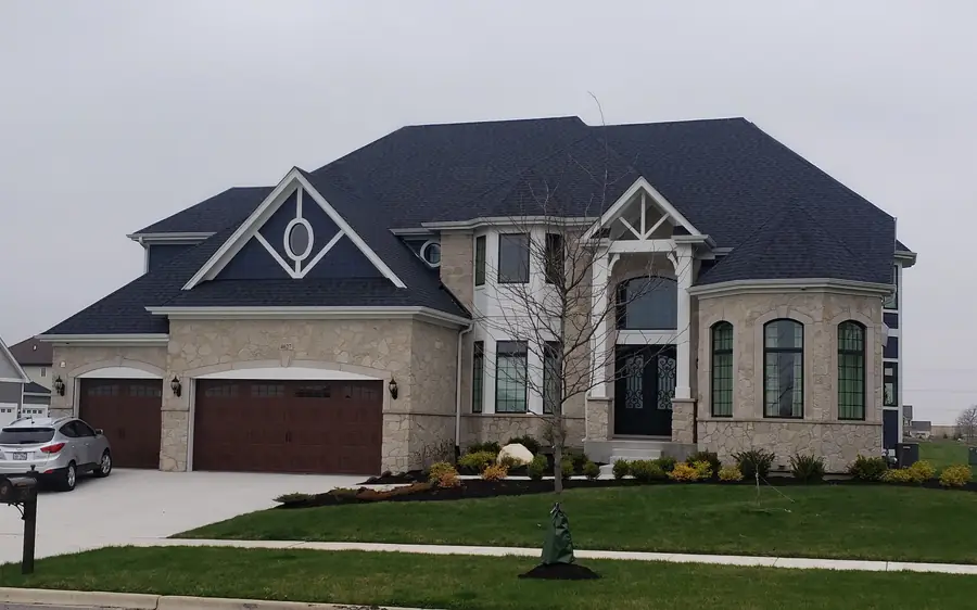 Blue-Grey Custom Home in Naperville by Skycrest Homes