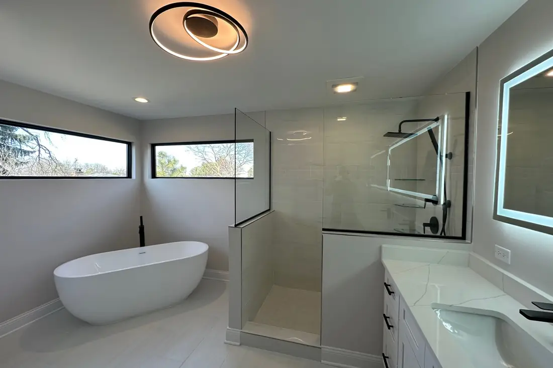 Primary bathroom with a tiled shower by Skycrest Homes