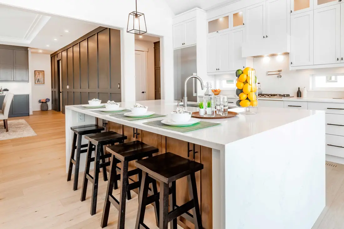Kitchen island and seating in a Skycrest Homes remodel