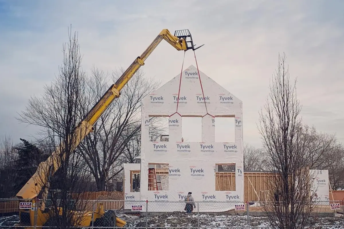 Skycrest crew setting framing panels on a custom home in Palatine