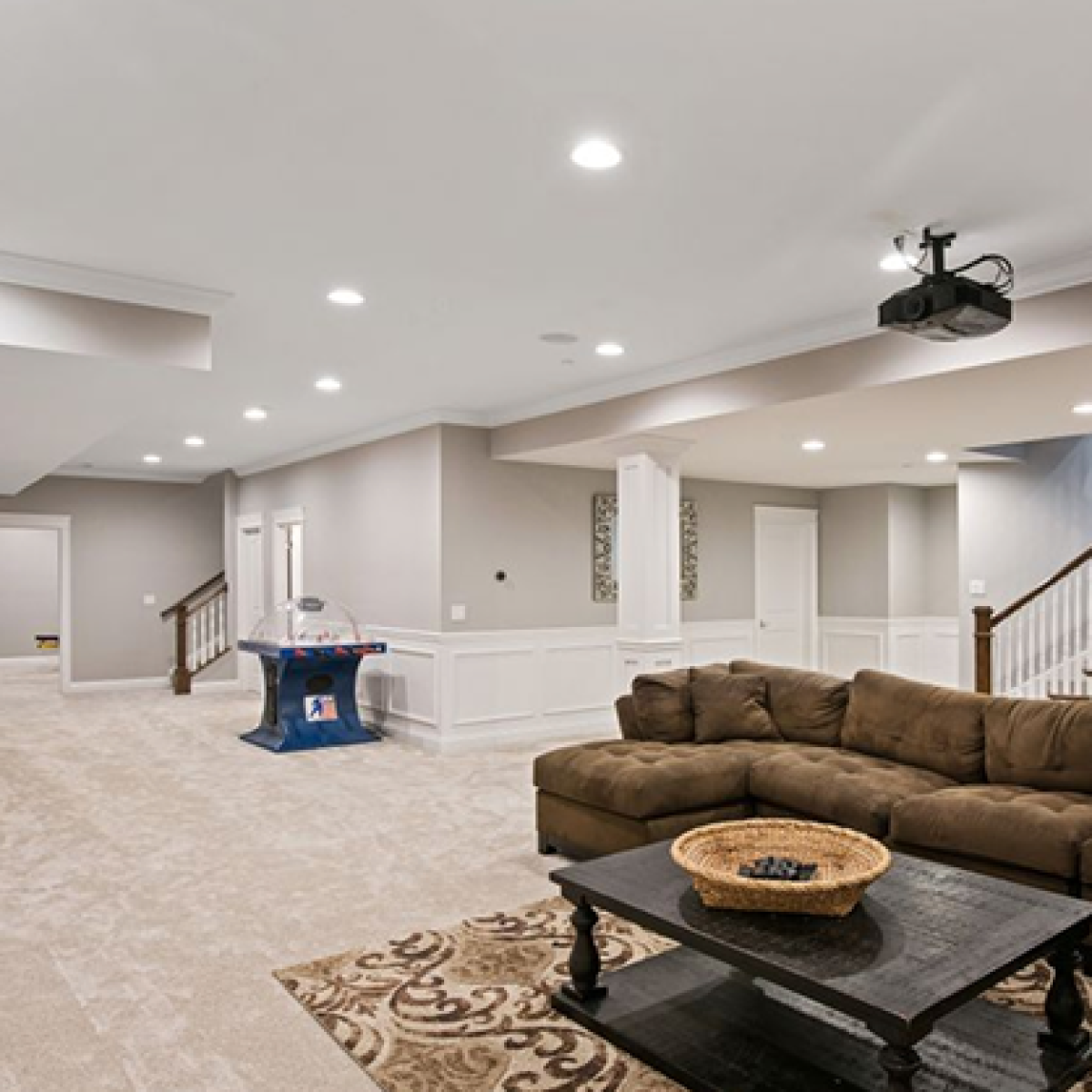 Professional lighting design for a finished basement family lounge