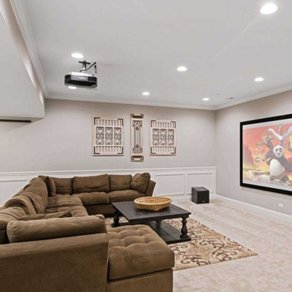 Basement home theater design by Skycrest Homes